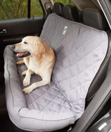 Large dog resting on a gray quilted Universal Pet Seat Cover, providing comfort and protecting car upholstery.