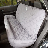 Gray quilted Universal Pet Seat Cover installed on a rear bench seat, featuring protective bolsters and a secure fit.