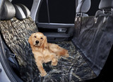 Camo Universal Pet Seat Cover installed in a vehicle, providing a comfortable and protective surface for a dog.