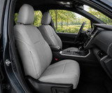 Genuine Leather Seat Covers installed in a vehicle, premium light gray leather upholstery with a clean tailored fit.
