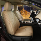 Genuine Leather Seat Covers in tan, luxurious custom-fit leather upholstery installed on front bucket seats.