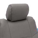 Close-up of Rhinohide Seat Covers showing the durable gray leatherette headrest cover with a snug custom fit.