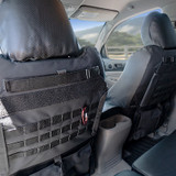 Close-up of Luxury Line Carbon Fiber Seat Covers featuring an optional Tactical MOLLE System for organized gear storage system on the seatback.