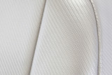 Close-up of Luxury Line Carbon Fiber Seat Covers showing the premium light gray carbon fiber weave and durable stitching.