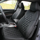Close-up of Luxury Line Diamond Stitch Seat Covers in black, showing the detailed quilted stitching and premium ostrich-textured leatherette.