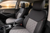 Luxury Line Diamond Stitch Seat Covers in a vehicle, two-tone black leatherette bolsters with light gray diamond-stitched inserts.