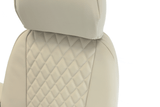 Diamond Stitch Seat Covers beige close-up with headrest and diamond-stitched insert panel.