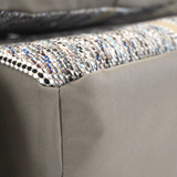 Detailed view of Luxury Line Saddle Blanket Seat Covers showing the seam between woven fabric and tan leatherette.