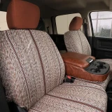Luxury Line Saddle Blanket seat covers on front buckets, heathered weave with brown stripes and leatherette console armrest.
