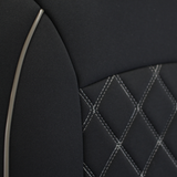 Detailed view of black Universal Neoprene Seat Cover featuring silver piping and precision diamond-stitched inserts.
