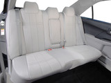 Neoprene Seat Covers installed on a rear bench seat in light gray, tailored fit with headrests and full coverage.