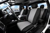 Toyota Waterproof CORDURA seat covers on truck front and rear, gray diamond-quilted inserts with black bolsters and headrest wraps.
