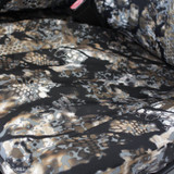 Close-up of the rugged tactical fabric on Kryptek Skyfall camo seat covers, highlighting the waterproof texture.