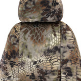 Close-up of the headrest and upper seatback of Kryptek Highlander camo seat covers, featuring a rugged tactical pattern.