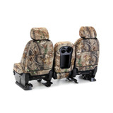 Rear/angled view of Realtree Camo NeoSupreme Seat Covers showing storage pockets and center console access.