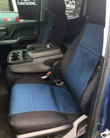 Passenger side view showing blue and black CORDURA® Xtra-Duty seat covers, including a matching center console cover for a fully protected and coordinated interior.