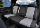 CORDURA 1000 Denier Xtra-Duty seat covers on rear bench, gray grid panels, black bolsters, headrests, and armrest cover.