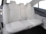 Neoprene Seat Covers installed on a rear bench seat in light gray, tailored fit with headrests and full coverage.