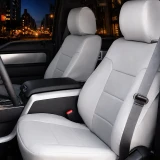 Sof-Touch Leatherette Seat Covers installed on front seats in a truck, smooth leatherette upholstery with a clean custom-fit finish.