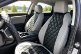 Sof-Touch Leatherette Seat Covers rear/angled view showing tailored fit, rear storage pockets, and center console access.