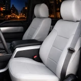 Sof-Touch Leatherette Seat Covers rear/angled view showing tailored fit, rear storage pockets, and center console access.