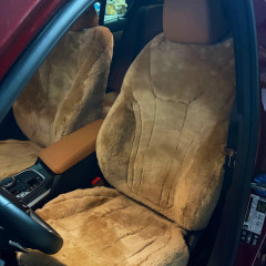 Tailor-made Sheepskin Seat Covers installed on front seats.