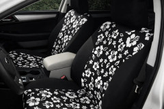 Hawaiian seat covers on front buckets, white hibiscus on black center inserts with solid black bolsters and headrests.