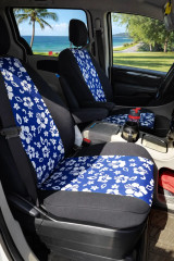 Hawaiian seat covers on front buckets, blue and white hibiscus center inserts with black bolsters and headrests.