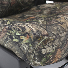 Close-up of Mossy Oak Waterproof Camo Seat Covers seat cushion showing waterproof camo fabric texture and stitching.