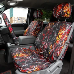 Moon Shine seat covers on front buckets in Wildfire camo, red orange and yellow branches with matching wheel cover.