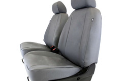 Atomic Pro-Tect Seat Covers shown on charcoal front bucket seats, custom-fit heavy-duty waterproof protection.
