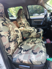 Military Camo Seat Covers installed on front seats with center console, classic camo pattern with full coverage.
