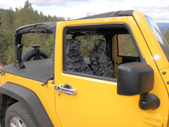 Military Camo Seat Covers installed in a yellow Jeep, digital camo pattern on front seats with a snug fit.