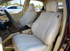 Exotic Seat Covers (Bone Croc) installed on a front seat, featuring a clean cream-colored crocodile skin embossed pattern.