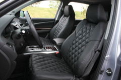Black Diamond Stitch Seat Covers on front bucket seats, featuring a luxury quilted pattern and tailored custom fit.