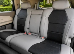 Exotic Seat Covers installed on front seats, featuring a bold red and black crocodile skin texture for a custom-fit luxury look.