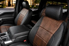 Exotic Seat Covers installed on front seats, featuring a brown crocodile skin texture with black ostrich accents for a premium look.
