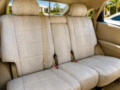 Exotic Seat Covers (Bone Croc) on rear bench seat, featuring a full-coverage cream crocodile skin embossed pattern.