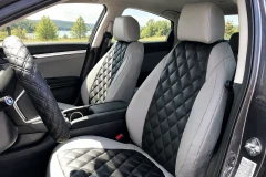 Sof-Touch Leatherette Seat Covers installed on rear seats, quilted black and gray leatherette with a tailored fit and full coverage.