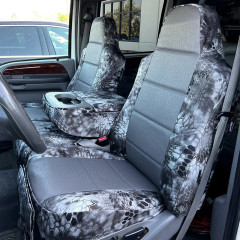 Luxury Line Kryptek camo seat covers on 40/20/40 with console, Typhon grey scales and ostrich-textured grey inserts.