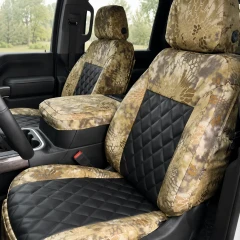 Luxury Line Kryptek camo seat covers on 40/20/40 seats with console, Highlander sides and black quilted leather inserts.