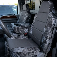 Luxury Line Kryptek camo seat covers on 40/20/40 with console, Typhon grey scales and ostrich-textured grey inserts.