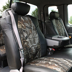 Luxury Line Sof-Touch Black with Realtree Camo inserts installed on front seats in a truck. Two tone camo with custom-fit look.