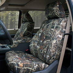 Luxury Line Realtree Camo Seat Covers on rear bench seat, full-coverage camo with seat belt access.