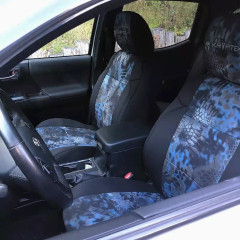 Custom-fit Kryptek® Camo seat covers in a striking blue "Pontus" pattern installed on front bucket seats, offering a bold tactical look for vehicle interiors.