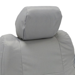Detailed view of Ballistic Seat Covers showing the custom-fit headrest and seatback in a durable gray heavy-duty fabric.