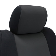 Close-up of NeoSupreme CK Seat Covers headrest in charcoal and black, showing the snug custom-fit design.
