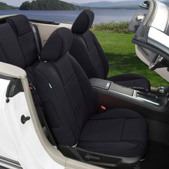 Solid black NeoSupreme CK Seat Covers installed in a white convertible, sleek custom-fit design for front and rear seats.