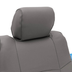 Close-up of Rhinohide Seat Covers showing the durable gray leatherette headrest cover with a snug custom fit.