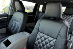 Luxury Line Carbon Fiber seat covers shown on front and rear seats, carbon bolsters and diamond-quilted black center inserts.